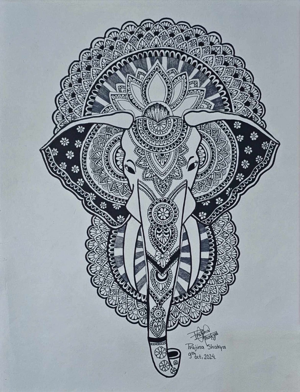 Mandala drawing in black ink