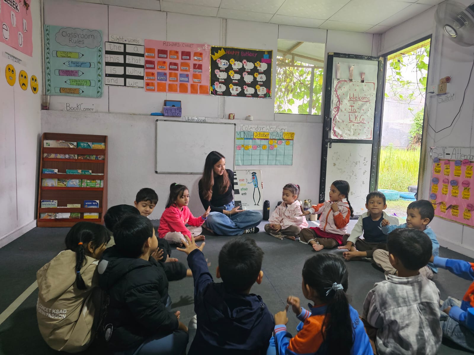 Volunteering with children at Happy Home Montessori
